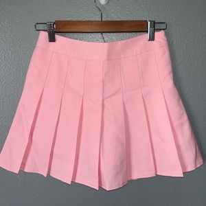 Pink pleated mini tennis skirt in Size M